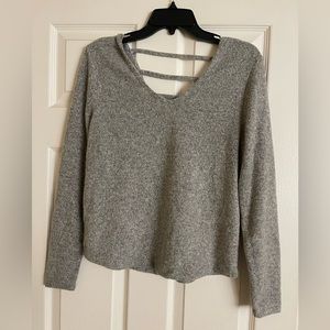 Love charm sweater size large with cut out detail